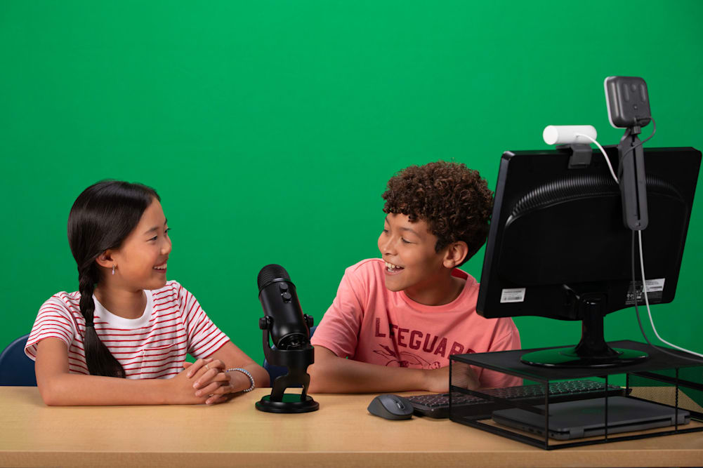 Students creating a vlog with Logitech streaming equipment