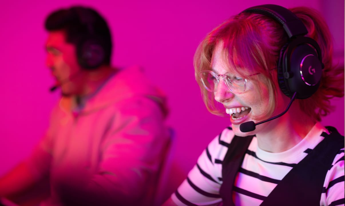 Woman playing game with headset