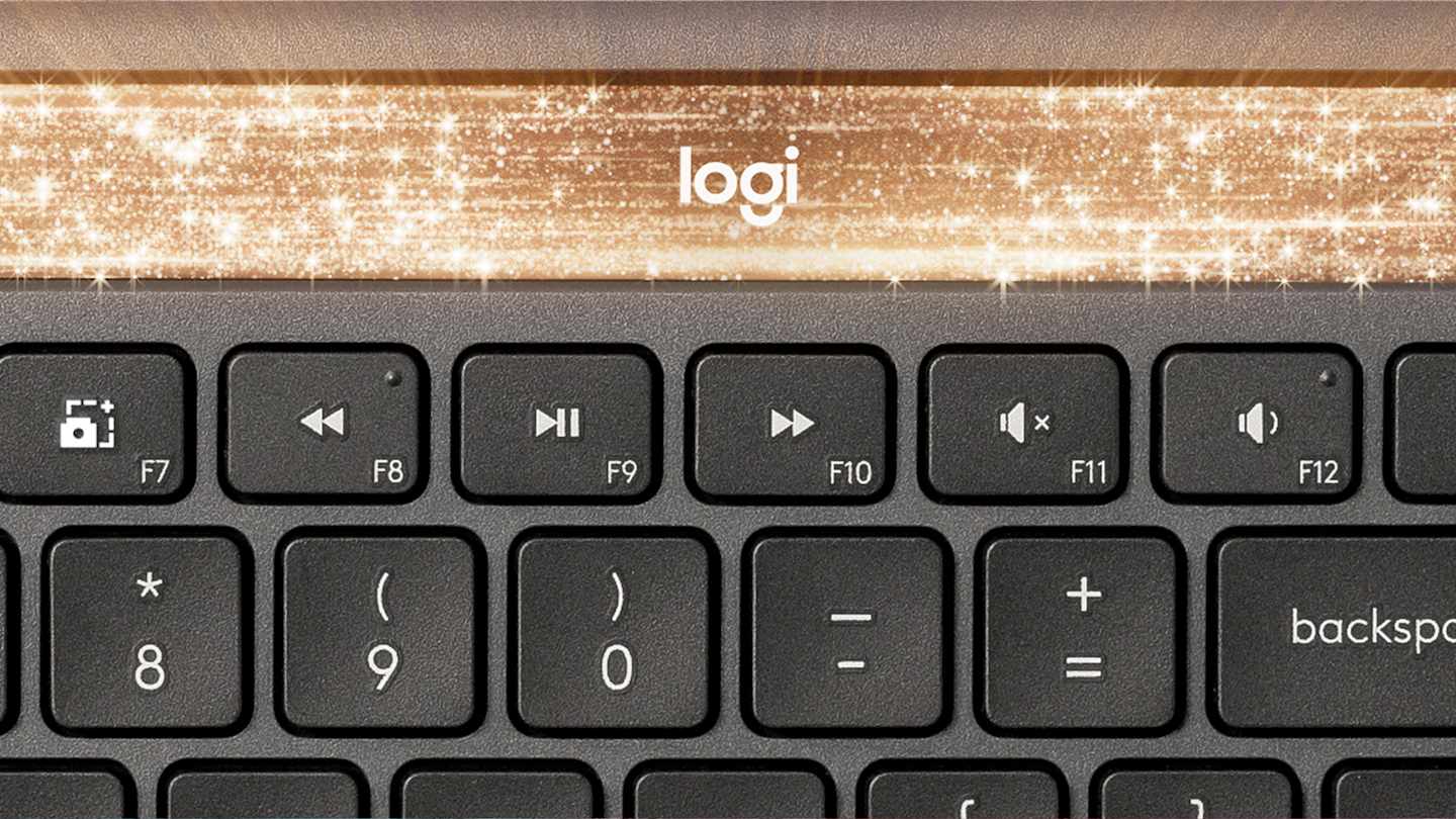 Logitech k980 signature slim solar+ grafitna tipkovnica z osvetljenim solarnim trakom