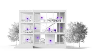 Office building cross-section showing LoRaWAN Gateway centrally placed, with signal points illustrating coverage on each floor