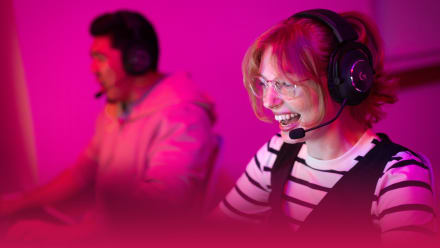 Woman playing game with headset