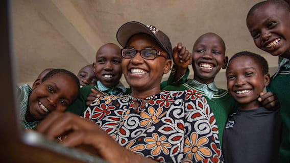 Nelly Cheboi with Kids