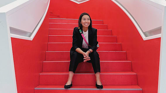 Ainura Sagyn in red background