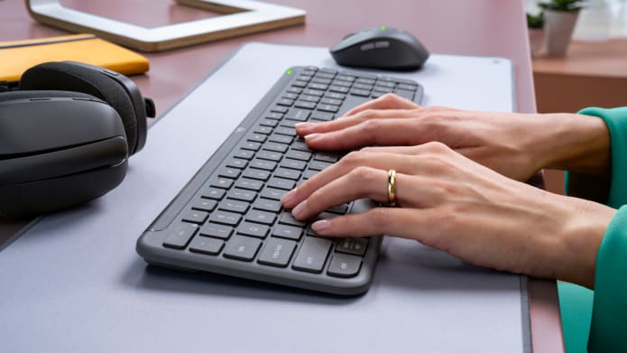 Woman working with signature slim combo for business