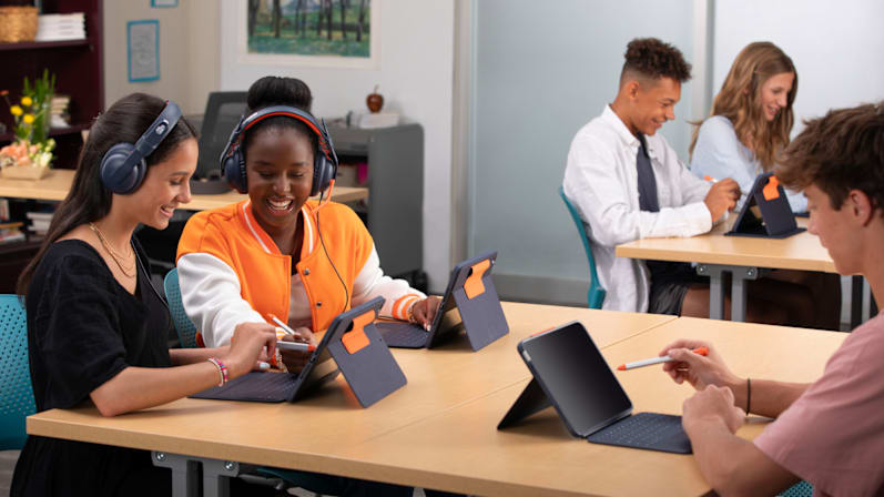 Classroom of students using tablets for learning